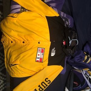 supreme x the north face yellow jacket